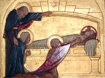 The fourteenth Station: Jesus laid within the sepulchre